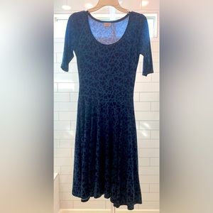 Like new worn 1x small Lularoe Nicole dress aqua/navy print shown in pictures